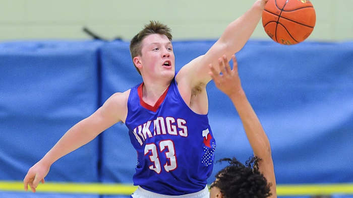 Wisconsin Lutheran guard Kon Knueppel (33) fouls Onalaska guard T.J. Stuttley (5) in the Wisconsin Basketball Yearbook Shootout on Thursday December 29, 2022, at Concordia University in Mequon, Wisconsin.